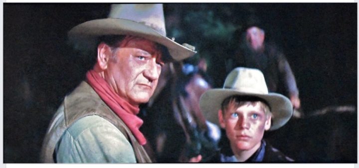 John-Wayne-Norman-Howell-The-Cowboys-color-720x337